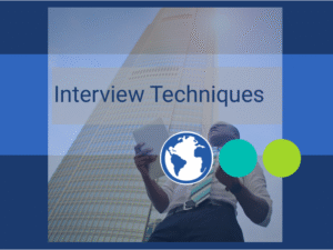 "Interview Techniques" young adult underneath business tower looking successful