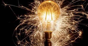 Sparkler behind a lightbulb